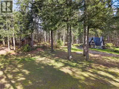 Introducing 2138 Left Road, a rare and enchanting storybook property. Set on a lush and private 2.18...