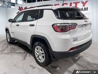 KBB.com 10 Best All-Wheel-Drive Vehicles Under $25,000. This Jeep Compass boasts a Regular Unleaded... (image 3)