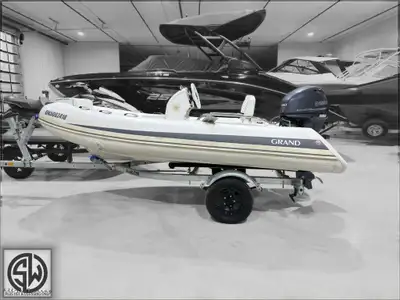 2015 GRAND 380 Features -------- - Deep-V fiberglass hull - Inflatable tubes - Center console - Stee...
