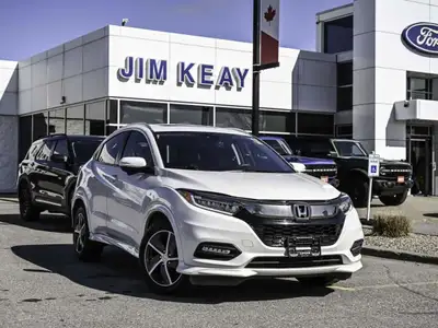 The 2022 Honda HR-V Touring, available at Jimkeayfordlincolnsalesltd in Orleans, is a brand-new comp...