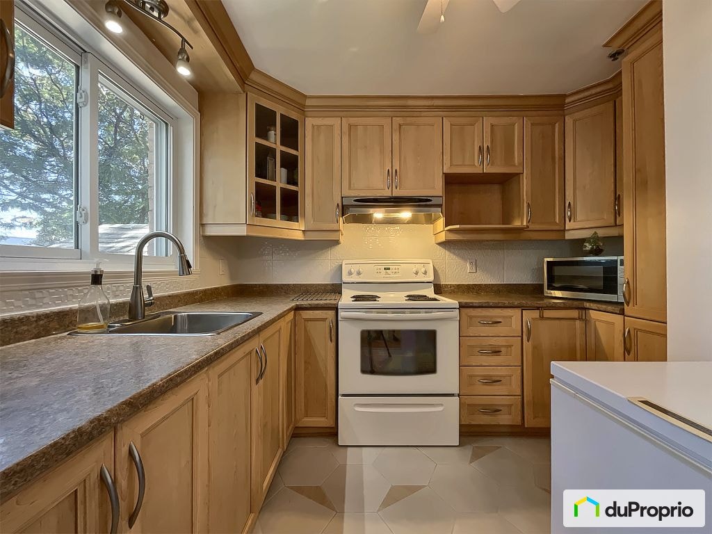 $245,000 - Condominium in Pointe-Aux-Trembles / East Montreal — photo 3