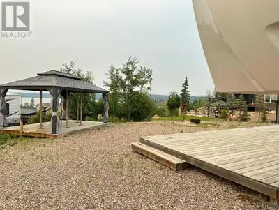 Welcome to Lauman's Landing!! There's a stunning lake view from your gazebo when you're not fishing...