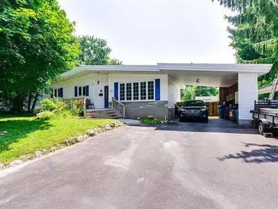 Charming 4-bedroom bungalow with cathedral ceilings. Offering a spacious and bright atmosphere, with...