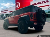 Unleash the beast within. This 2022 Ford Bronco Raptor, a Code Orange convertible with a Black Onyx... (image 3)