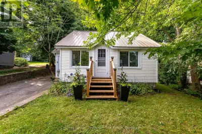 Nestled in town, this adorable one-and-a-half-story home effortlessly blends cozy charm with modern...