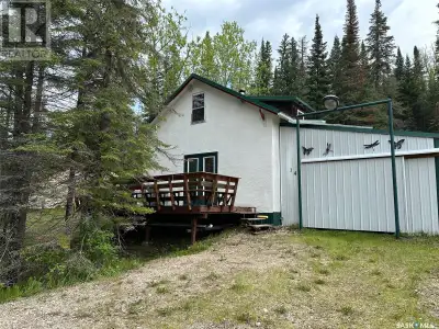 A rare opportunity has opened up at Parr Hill Lake—a charming two-story cabin with lake views, full...