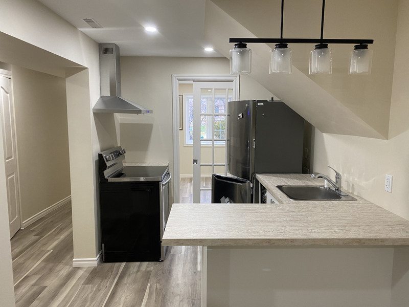 Newer Build, Beautiful 2 Bed + Den Lower Unit on Logan Crt. Long Term