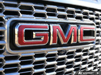 Command the road in this 2022 GMC Yukon XL Denali, a pinnacle of SUV luxury and capability. Boasting... (image 9)