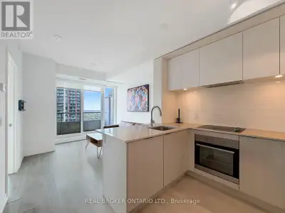Sky-High Living in the Heart of Regent Park | 1+1 with Park, City & Lake ViewsTwenty-four floors up,...