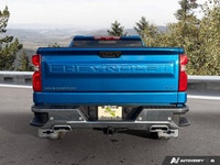 Command the road and conquer any task with this robust Blue 2024 Chevrolet Silverado 1500 LTZ. Equip... (image 3)