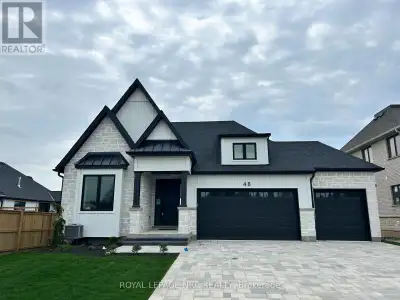 Step into luxury with this stunning bungalow with 3 car garage nestled in the heart of Niagara on th...
