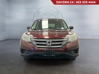 The 2013 Honda CR-V LX 4WD delivers a smart combination of everyday practicality, confident all-weat... (image 1)