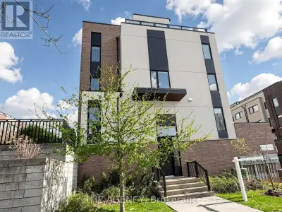 This Stunning Corner Townhouse is ONE of the Largest in the Community and Features a Wraparound Balc...