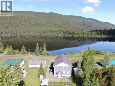 Discover this beautifully finished home with panoramic views of Hendrix Lake—a true gem for outdoor...