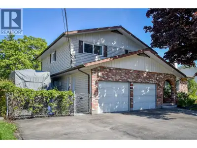 Check out this beautifully-appointed custom built, quality 4 level split family home situated on a q...