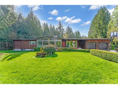 Excellent value, 24,000+ sqft lot, Assessment $2,202,000. Charming rancher with full updated basemen...