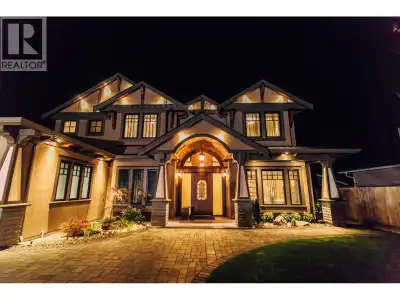Exceptional custom-built luxury home in prestigious Seafair. Situated on a 7,030 sq.ft. lot with 3,3...