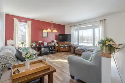 R16//Mitchell/Welcome home to 34 Hazelwood. Nestled on a serene, treed 2-acre lot, this spacious 5-b...