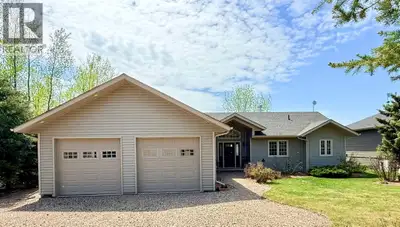 Stunning lake side home on Northern Meadows Drive won't stop giving the best things in life. Over 16...