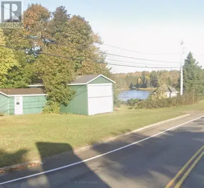 Discover a rare opportunity to own a premier 0.2-acre waterfront corner lot in the heart of the pict...