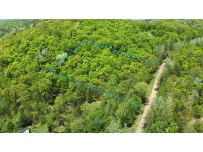 3.24-acre lot located at 56 Ch du Mica in Val-des-Monts. Peaceful setting offering privacy in a wood...