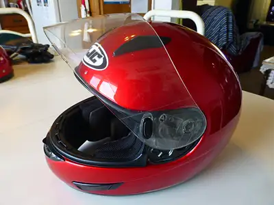 HJC CL-15 full face motorcycle riding helmet in candy red. This helmet has a flow through ventilatio...