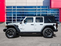 2.0L I4 DOHC. Bright White Clearcoat 2024 Jeep Wrangler Rubicon 4xe 4WD 8-Speed Automatic 2.0L I4 DO... (image 1)