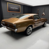 Check out this 1967 Ford Mustang Fastback. This is a gorgeous car. The gold paint is incredible and... (image 3)