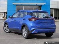 Navigate city streets with confidence and style in the 2022 Nissan Kicks S, striking in Electric Blu... (image 3)