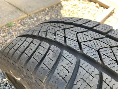 YES WE DO SHIP ACCROSS CANADA AND USA AT VOLUME DISCOUNT RATES a nice Pirelli winter tire in great s...