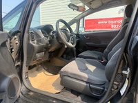 A practical subcompact hatchback with excellent fuel efficiency, easy maneuverability, and a surpris... (image 8)