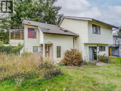 Nestled at the base of Mount Doug, this beautiful family home offers the perfect blend of tranquilit...