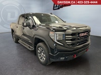 The 2024 GMC Sierra 1500 AT4 Crew Cab Short Box 4WDblends premium craftsmanship, rugged off-road cap... (image 2)