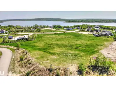 FULL FILL YOURSELF AT EXTRAVAGANT LAC SANTE! - Sante Estates is a pristine subdivision with beach ac...