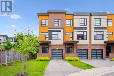 Tucked away in a private, upscale enclave, this corner unit in the award-winning Gallery Towns by Gr...