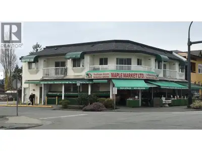 This is a long-established produce and groceries store (Upper 3 apartments units above could be for...