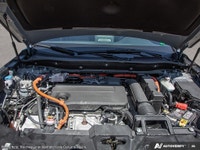 Explore the elegance and capability of the 2026 Honda CR-V Hybrid Touring AWD, draped in a sophistic... (image 5)