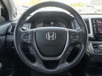 Experience the perfect blend of pickup capability, everyday comfort, and Honda reliability with the... (image 9)