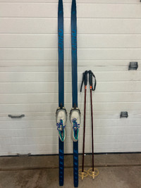 Youth Karhu cross country ski . boots and poles.