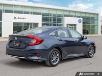 * 8-way power-adjustable driver's seat. * Heated front seats. * Dual-zone automatic climate control... (image 4)