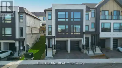 Stunning End-Unit Modern Townhome!! Welcome to this Beautifully designed End-Unit Townhome offering...