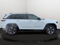 This Jeep Grand Cherokee is equipped with: Remote Start, 2.0L I4 DOHC, 4WD, 10 Speakers, Capri Leath... (image 6)
