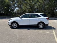 The used 2022 Chevrolet Equinox LS AWD is a smart choice for drivers who want confidence, comfort, a... (image 9)