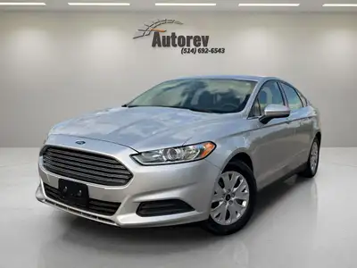 2014 Ford Fusion. Prix: 5980$ Odomètre: 124 000 KM Couleur extérieure: Argent Couleur intérieure: Gr...