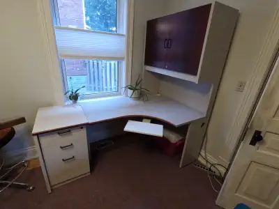 Commercial desk with hutch. Includes three drawer side unit. Long side of desk is 55 inches and shor...