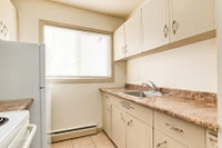 Amenities: Heat & Water Included • Spacious Rooms • Affordable Parking Suite & Building: One-bedroom... (image 4)