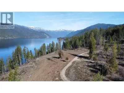 Rare opportunity to own a dynamic 2.9-acre lake view lot in picturesque Christina Lake, BC! Breathta...