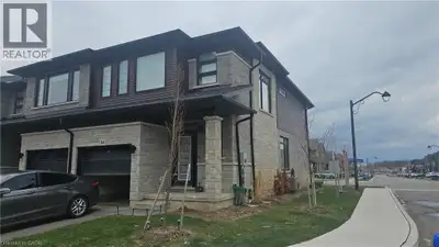 Stunning West Brant End-Unit Townhome for Lease. Welcome to 461 Blackburn Drive, Unit #14! This mode...