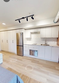 Modern and comfortable unit featuring: Stainless steel fridge Efficient heat pump Window coverings i... (image 8)