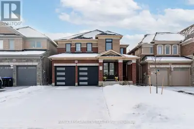 Modern luxury and convenience is all here in this immaculate 5-bedroom, 4-bath home. Filled with nat...